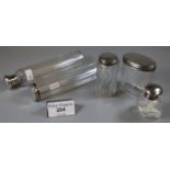 Collection of 4 silver topped glass dressing table jars, together with a silver topped glass scent