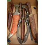 Collection of Asian and Middle Eastern souvenir knives and daggers including Kanjar, and