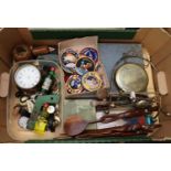 Box of oddments to include Apollo landing patches, small dinner gong, silver collared knives and
