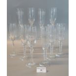 Set of six etched glass champagne fluted with bobbin stems, together with another set of four