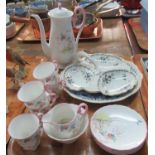 Dainty Shelley coffee set decorated with countyside scene, flowers and butterflies and edged in pink