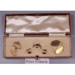 A cased set of 9ct gold cuff links and collar studs. Approx weight 8.2g. (B.P. 21% + VAT)