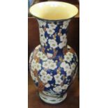 Oriental design pottery floor vase, overall with prunus, flowers and foliage. Unmarked. 78cm