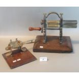 E & T Clark's Warranted crimping machine on oak base, together with a vintage brass single