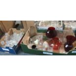 Two boxes of assorted glassware to include: cranberry vase with a clear glass stem, 2 other