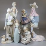 7 Lladro and Nao Spanish porcelain figurines to include: 'Clown', 'Young girl with Pot of