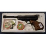 German Feinwerk Bau model 65.177 target air pistol with sculpted wooden grip in original box with