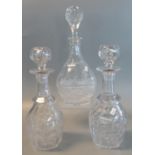 Pair of Georgian design glass mallet-shaped decanters with stoppers with another mallet-shaped