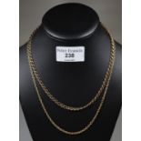 A 9ct gold chain, approx weight 10g. Together with a gold coloured chain. (B.P. 21% + VAT)