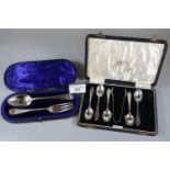 Victorian silver cased christening spoon and fork set, together with a cased set of 5 silver