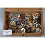 Wooden cigar box comprising military badges/brooches to include Royal Navy, HMS Victorious, RAF,