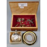 A collection of costume jewellery including a silver stamp box, a gilt baby bangle, Maltese cross