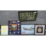 Group of RAF and other militaria items to include watercolour study of a Spitfire, tapestry of a