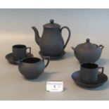 Early 20th century Wedgwood black basalt eight piece coffee set to include two coffee cans and
