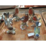 Collection of Goebel West Germany figurines of birds to include three Robins, Blue Tit, and two