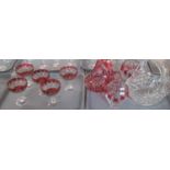4 trays of mainly glassware, to include: cut glass baskets, pair of cranberry and clear glass vases,