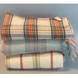 Three Welsh woollen check blankets. (3) (B.P. 21% + VAT)