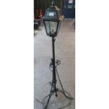 Wrought iron standard lamp with street lantern type top. (B.P. 21% + VAT)