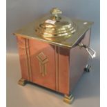 Art Deco copper and brass two handled lidded coal bin with geometric feet.(B.P. 21% + VAT)