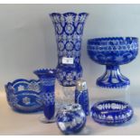 Collection of blue flash cut glass items to include large vase, trumpet vase, pedestal fruit bowl,