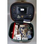Collection of Vintage jewellery in green vanity case, to include hat pins, Cameos, brooches etc (B.