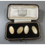 A cased pair of 9ct gold cufflinks in T.W. Long & Co Swansea box. Approx weight 5.7g. (B.P. 21% +