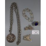 A collection of silver and white metal jewellery including two silver filigree brooches and a