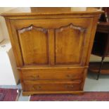 18th century style oak TV unit/cabinet having two ogee fielded panels above two drawers. (B.P. 21% +