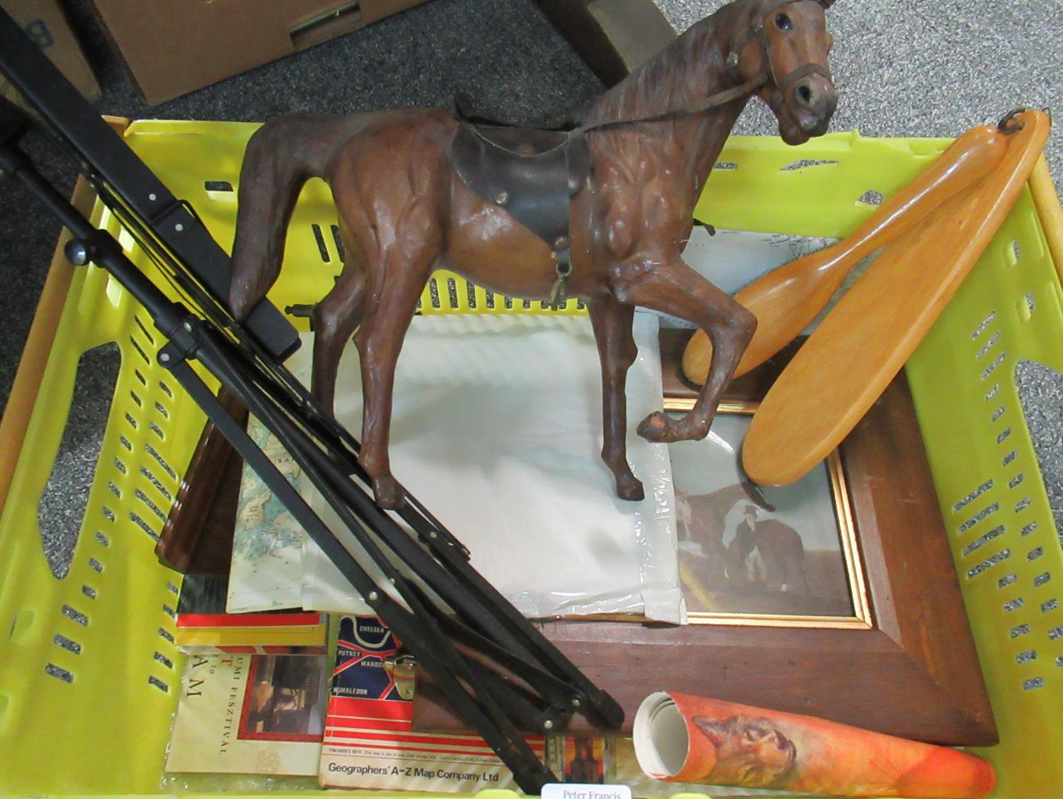 Box containing leather horse, metal music stand, map, 19th century style print of a racehorse and