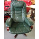 Modern green leather swivel armchair. (B.P. 21% + VAT)