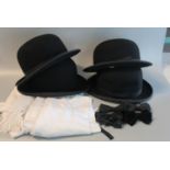 Four vintage bowler hats, together with four dickie bows and four white scarves. (B.P. 21% + VAT)