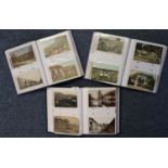 Three albums of postcards to include Irish and Welsh scenes, theatre, Japan, Bombay, Earthquake