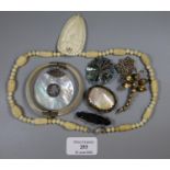 A collection of silver and costume jewellery including a Victorian acorn brooch, silver gem set