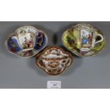 Meissen German porcelain cabinet cup and saucer with painted panels of figures and flowers, cross