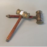 2 similar brass headed gavels or toffee hammers both with turned wooden handles. 19cm long and