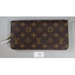 In the style of Louis Vuitton ladies leather purse with gold finish zip. (B.P. 21% + VAT)