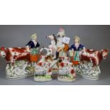 Collection of Staffordshire flatback figurines to include spaniels, cows, etc. (5) (B.P. 21% + VAT)