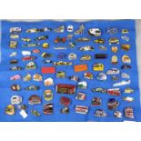 Collection of vintage automobile badges to include: motorbikes, cars, F1, VW campers, trams,