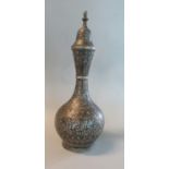 Probably Indo Persian niello metal baluster shaped vase and cover, overall with Islamic design,