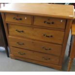Early 20th century oak straight front chest of 2 short and 3 long drawers on platform base with