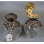 Pair of early 20th century presentation silver repoussé and glass dimple scent bottles, makers