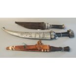 3 Caucasian/Middle Eastern daggers, including a Quanjar with ebony handle and silver relief