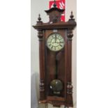 Early 20th century walnut two-train Vienna type wall clock with pendulum, weights and key. (B.P. 21%