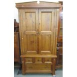 Modern pine two-stage, two door blind panel wardrobe, the base with an arrangement of four