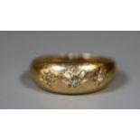 18ct gold three stone diamond ring. Ring size M. Approx weight 3.9g. (B.P. 21% + VAT)