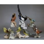 Collection of Hummel and other Continental porcelain birds and bird groups to include Magpie,