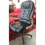 Modern leather finish and silvered swivel computer chair with adjustable arms. (B.P. 21% + VAT)