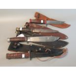 Group of assorted British sheath knives and a wooden handled survival knife. (5) (B.P. 21% + VAT)