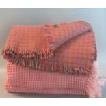 Tweed Mill pure new wool blanket, together with a pink ground honeycomb blanket. (2) (B.P. 21% +