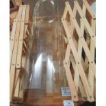 Two collapsible wine racks and a Victorian glass dome. (B.P. 21% + VAT)